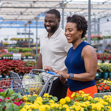 Image of two customers shopping in a Walmart Garden Center.