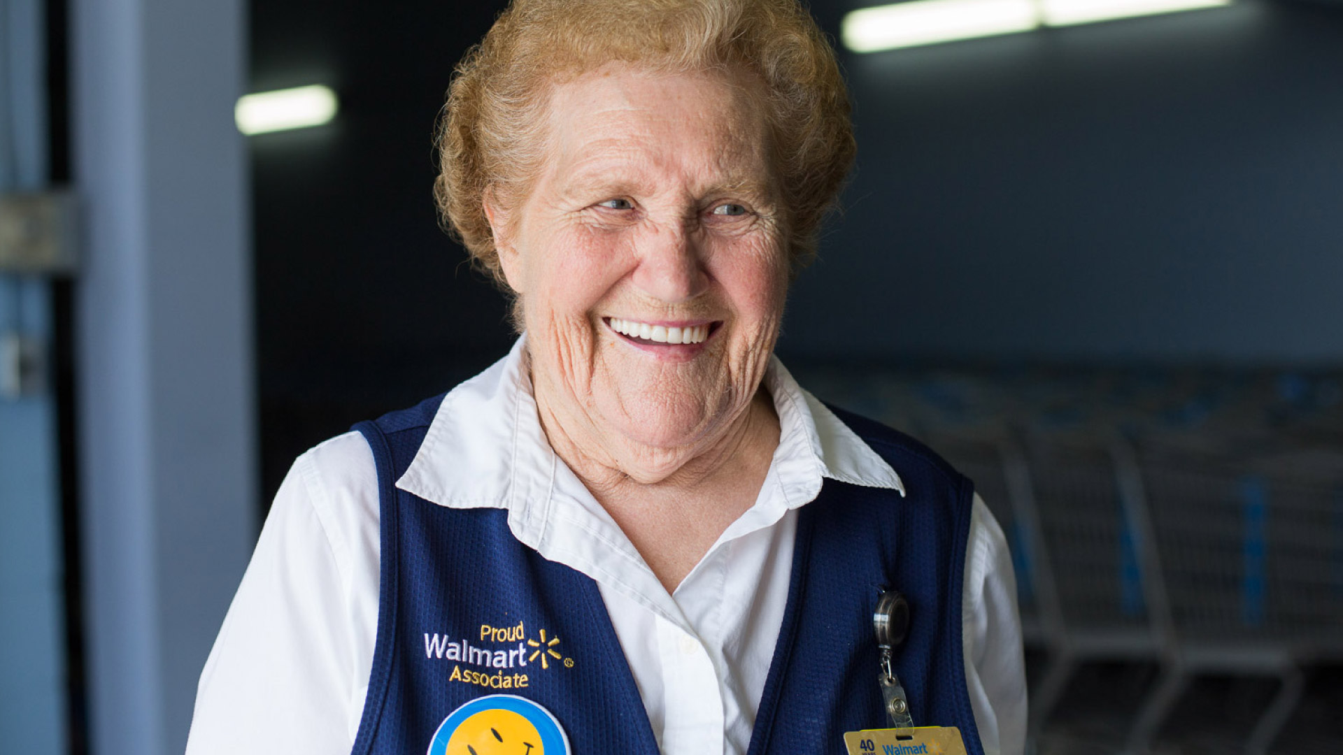Photo of a Walmart Associate smiling at the camera.