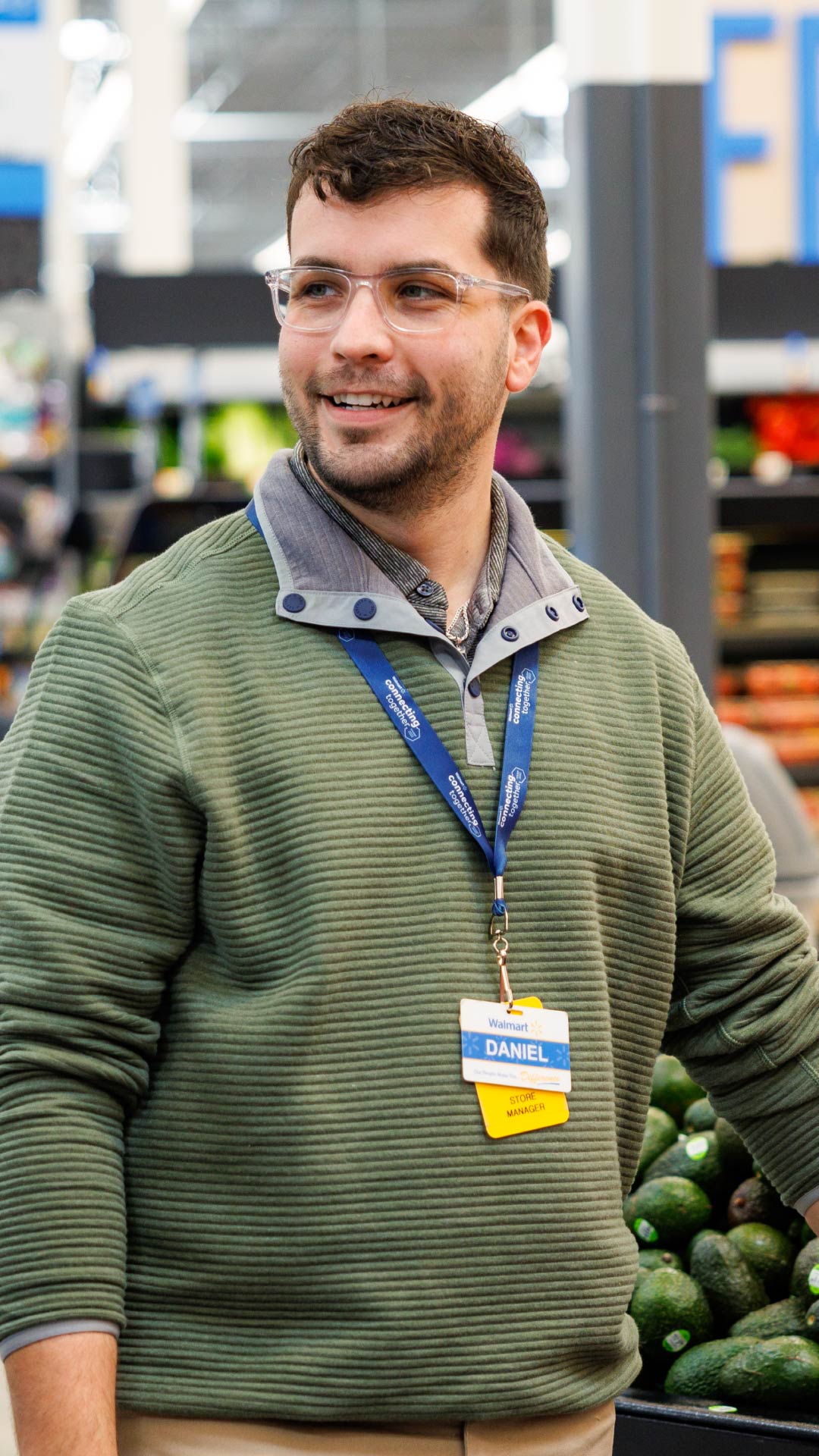 Photo of a Walmart Associate smiling at the camera.